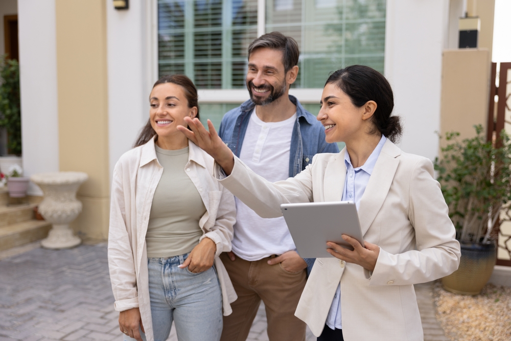 Real estate agent showing a BC property with multiple offers